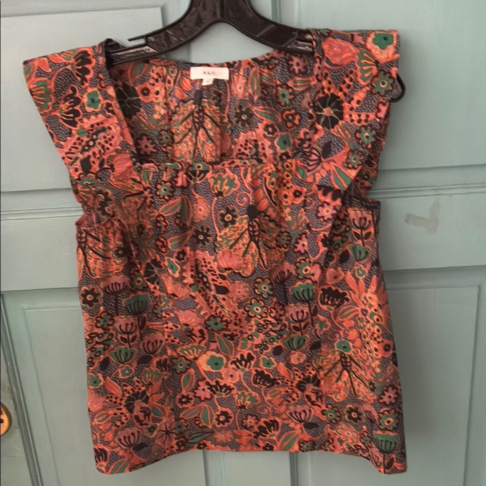 A.L.C. Square neck sleeveless top in size O. This blouse is NWOT. Very colorful